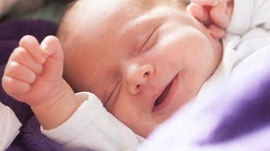 Bebê sorrindo - (Foto: iStock)