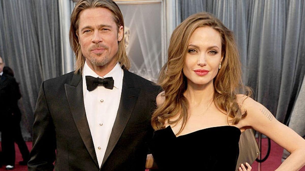 Angelina Jolie e Brad Pitt com os filhos, antes do divórcio - Reprodução / Monet