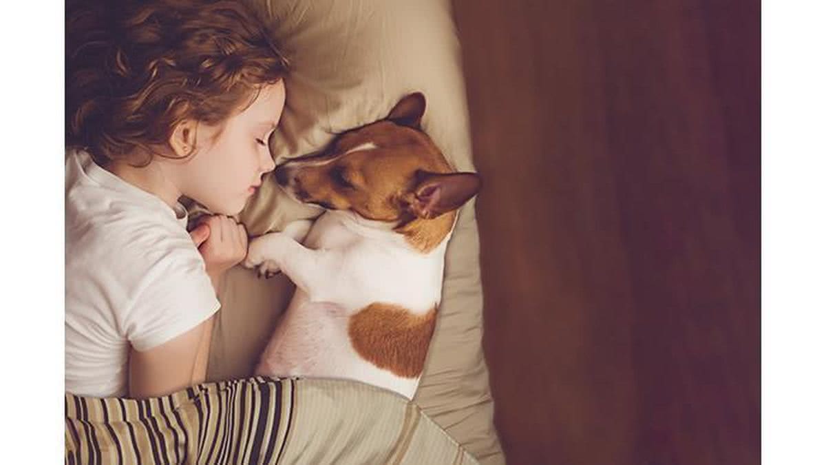Relação de criança com pet é benéfica para saúde - Getty Images
